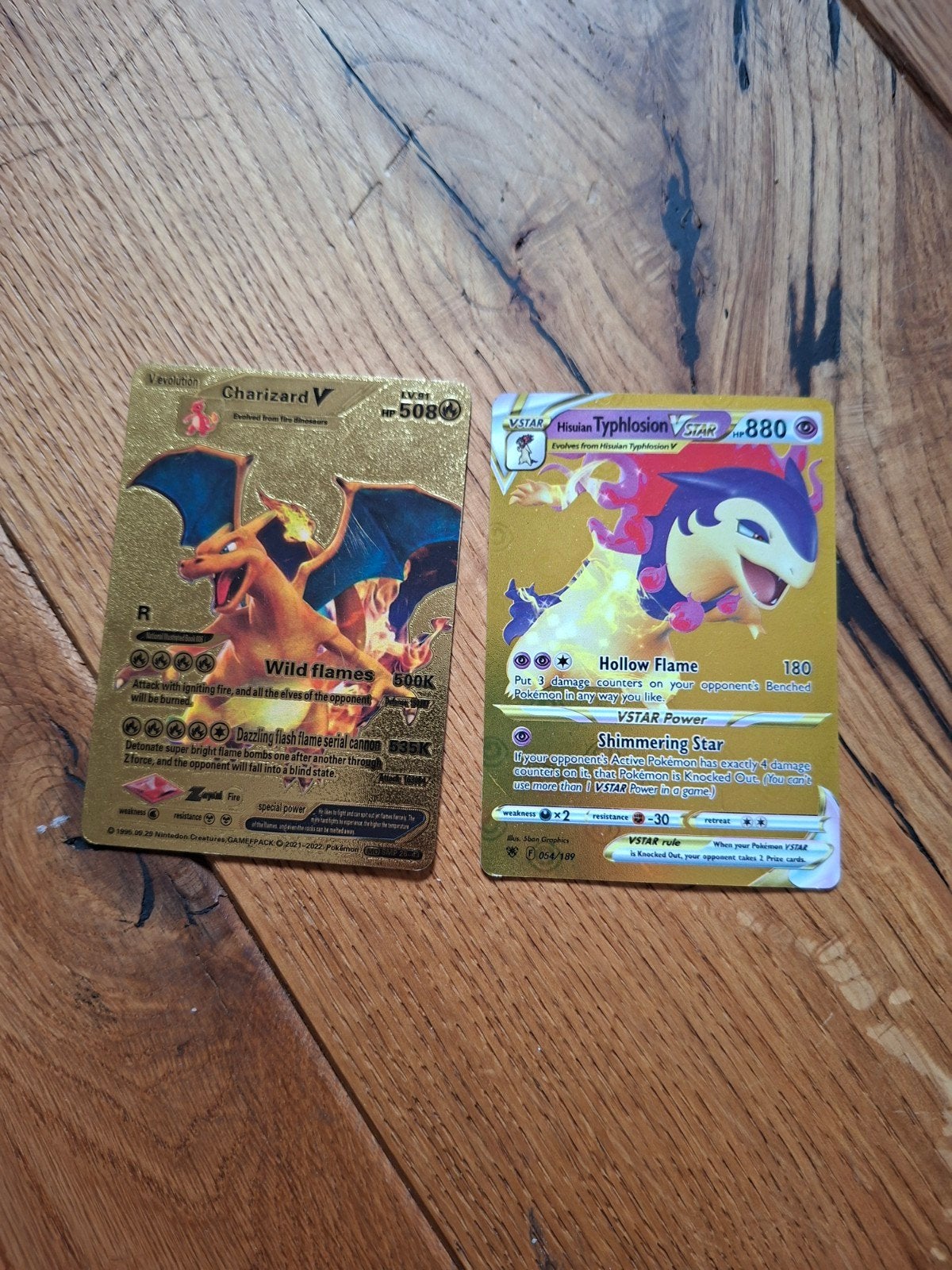 Pokémon Kaarten: Charizard V & Hisuian Typhlosion VSTAR, Ophalen of Verzenden, Gebruikt, Meerdere kaarten