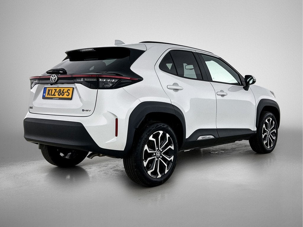Toyota Yaris Cross 1.5 Hybrid 115 Dynamic (bj 2025), 12 maanden, Gebruikt, 116 pk, Wit