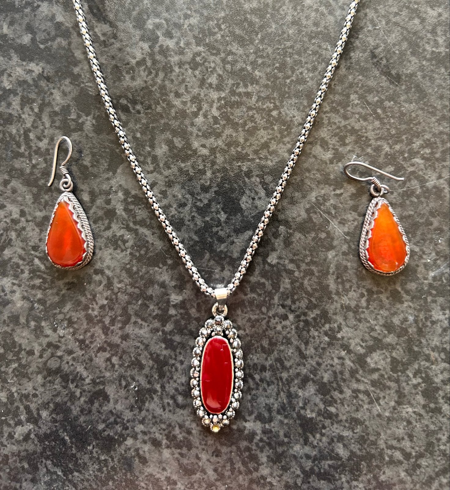 Zilveren ketting en oorbellen 925 met rode en oranje stenen, Gebruikt, Overige kleuren, Ophalen of Verzenden, Met edelsteen
