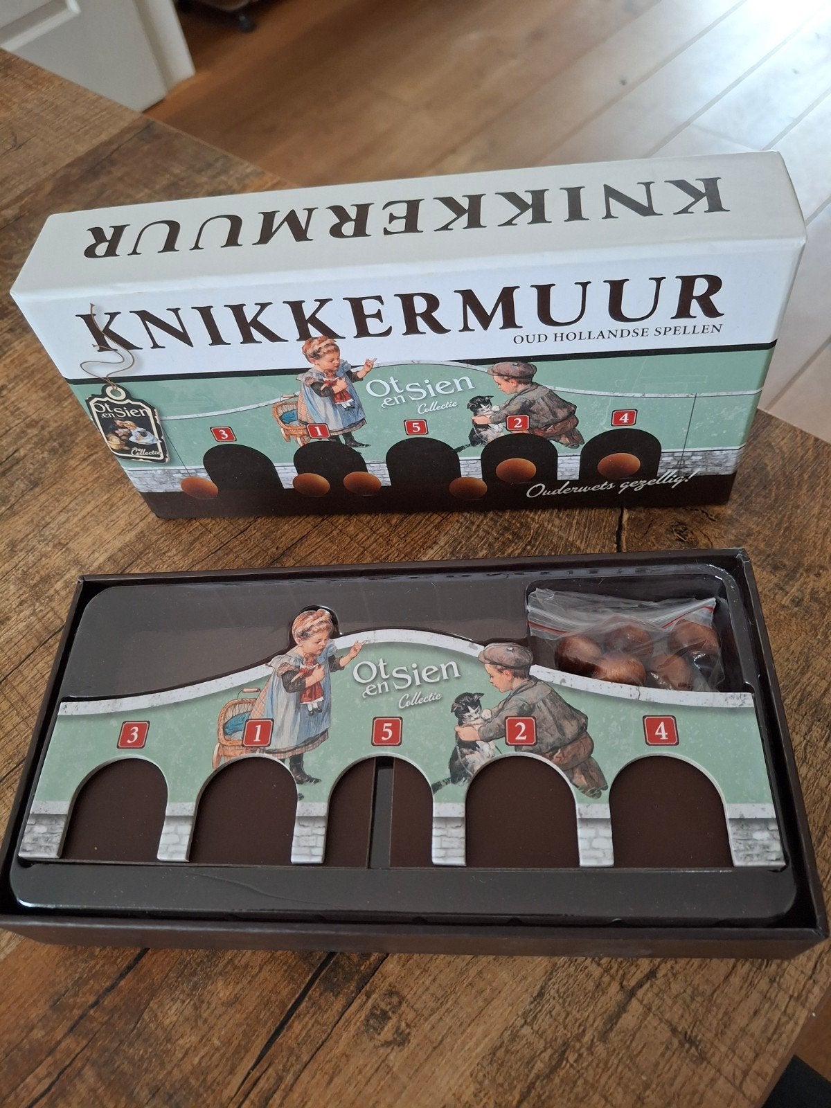 Ot en sien knikkermuur, Ophalen of Verzenden