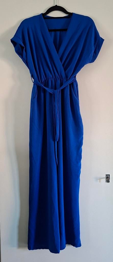 Stijlvolle blauwe jumpsuit met strikceintuur, Kleding | Dames, Jumpsuits, Maat 38/40 (M), Blauw, Ophalen of Verzenden, Onbekend