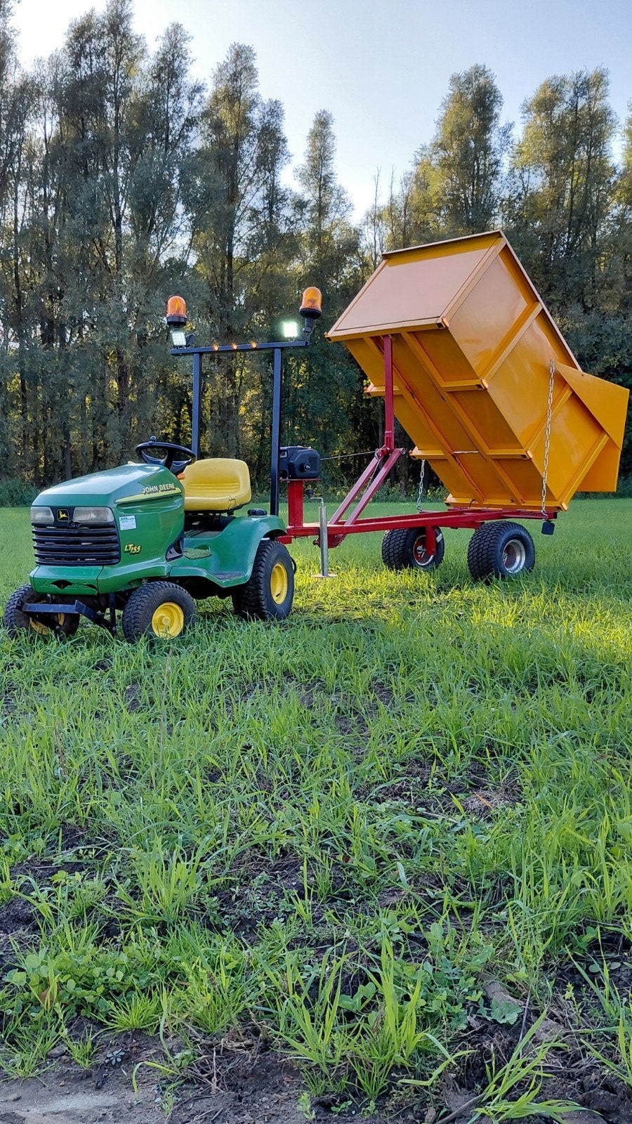 John deere zitmaaier met kiep kar, Ophalen