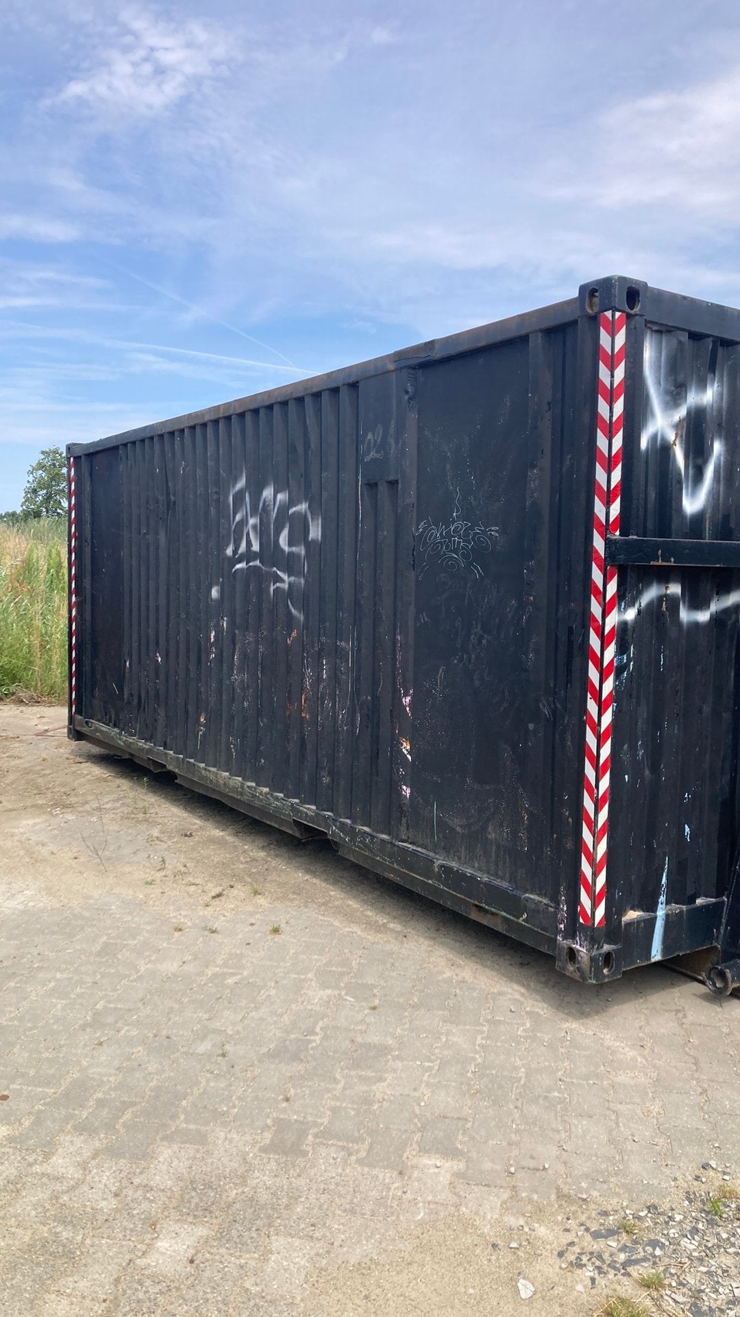 Zeecontainer/opslag met haakarm afzetsysteem, Ophalen