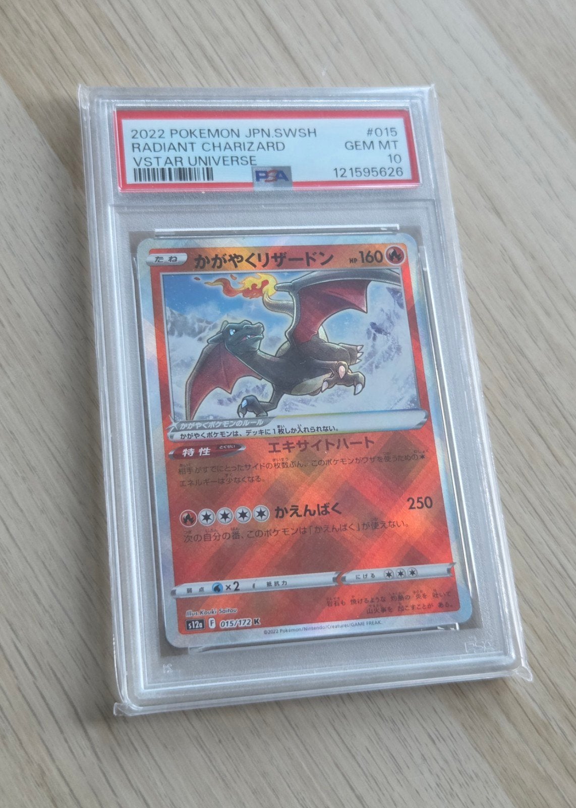 PSA 10 | Radiant Charizard, Ophalen of Verzenden, Zo goed als nieuw