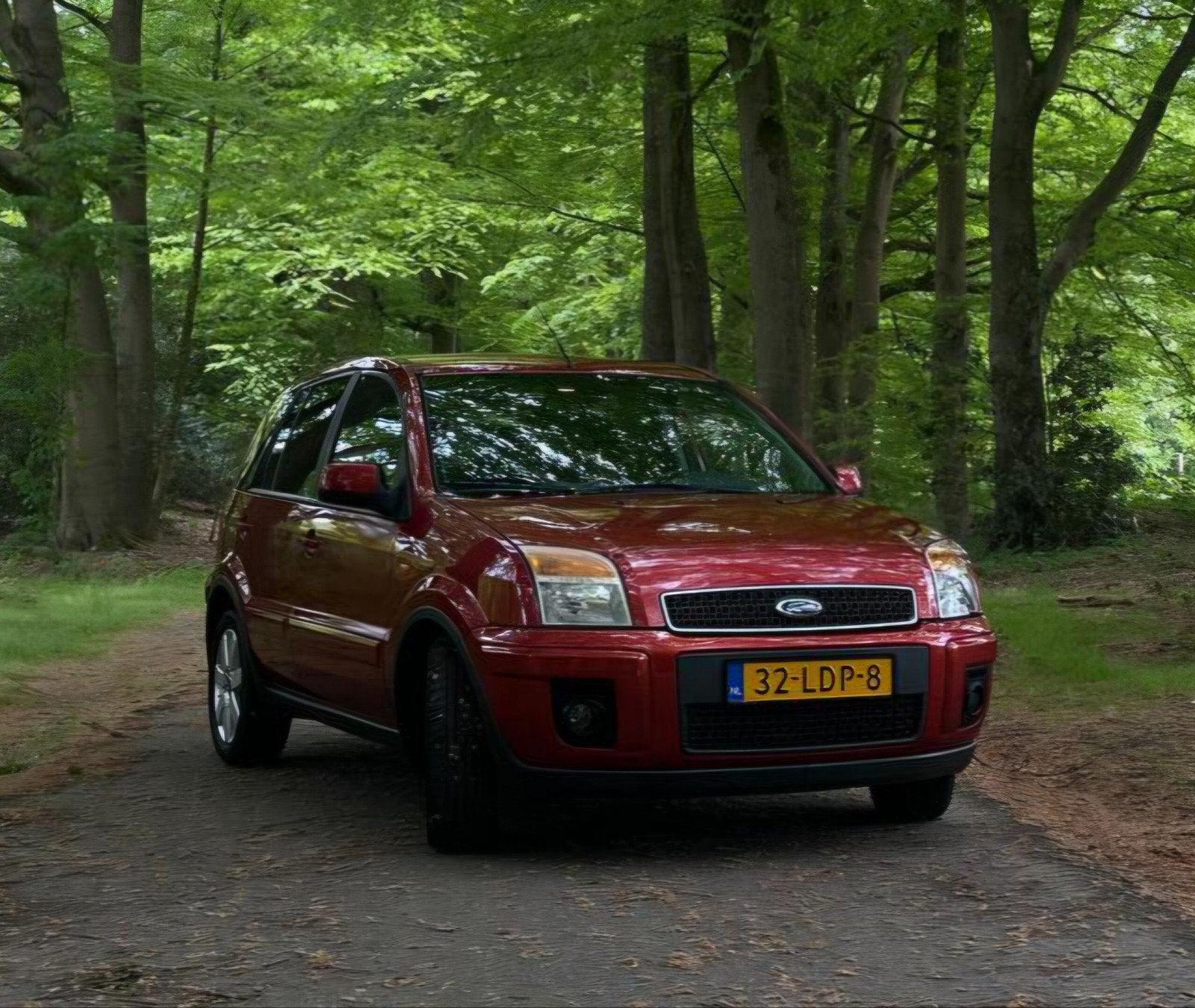 Ford Fusion 1.6 16V AUT 2010 Rood, Auto's, Ford, 1596 cc, 1064 kg, 100 pk, 49 €/maand