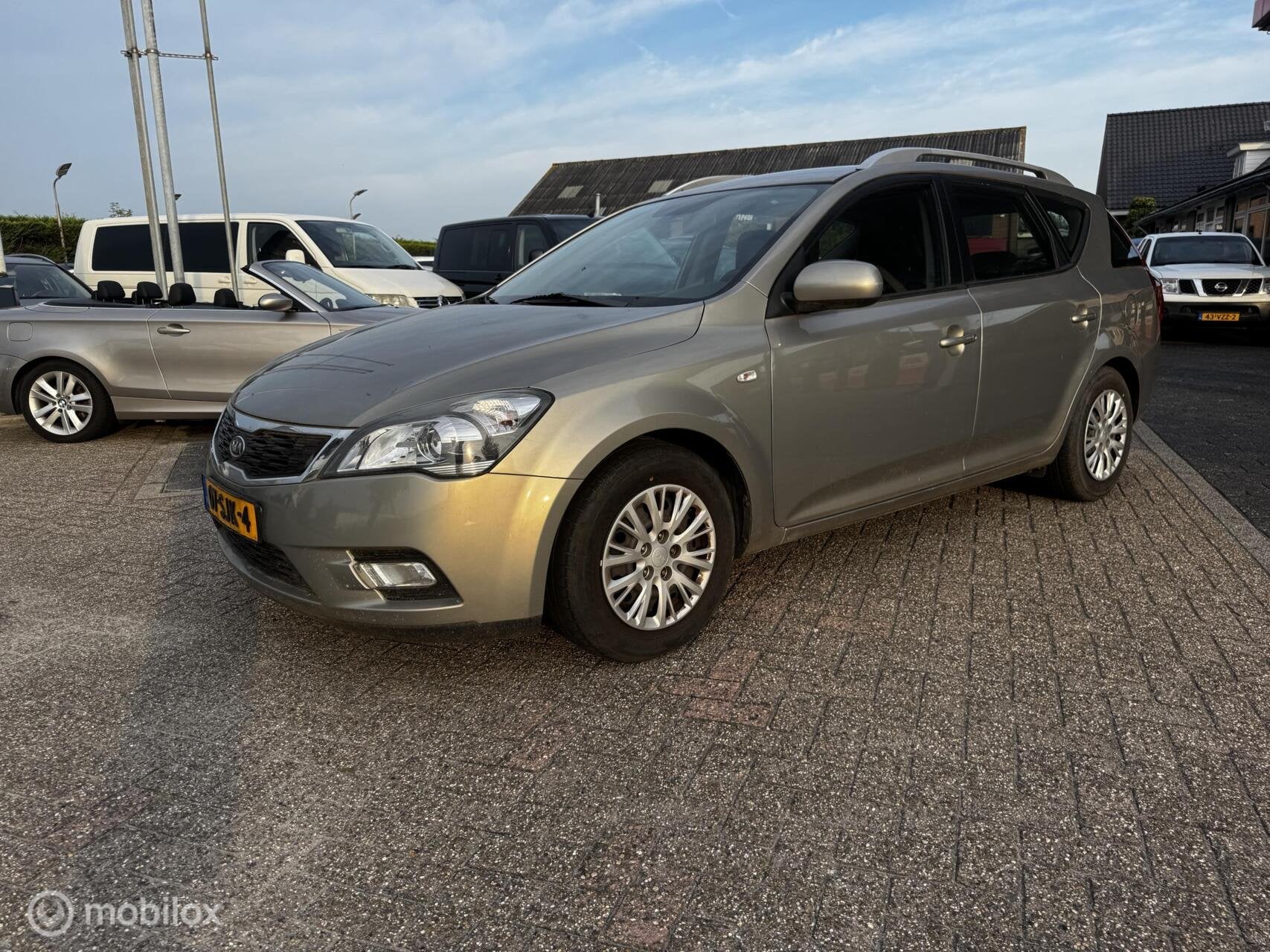 Kia cee'd Sporty Wagon 1.4 CVVT Navigator Plus Pack, Auto's, Voorwielaandrijving, Euro 5, 4 cilinders, 1396 cc