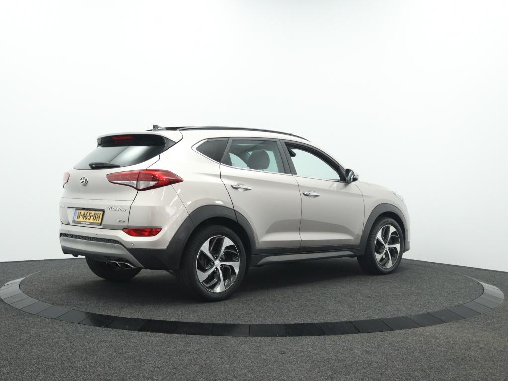 Hyundai Tucson 1.6 T-GDi premium Sky 4WD Automaat | Panodak, 12 maanden, Gebruikt, 4 cilinders, Wit