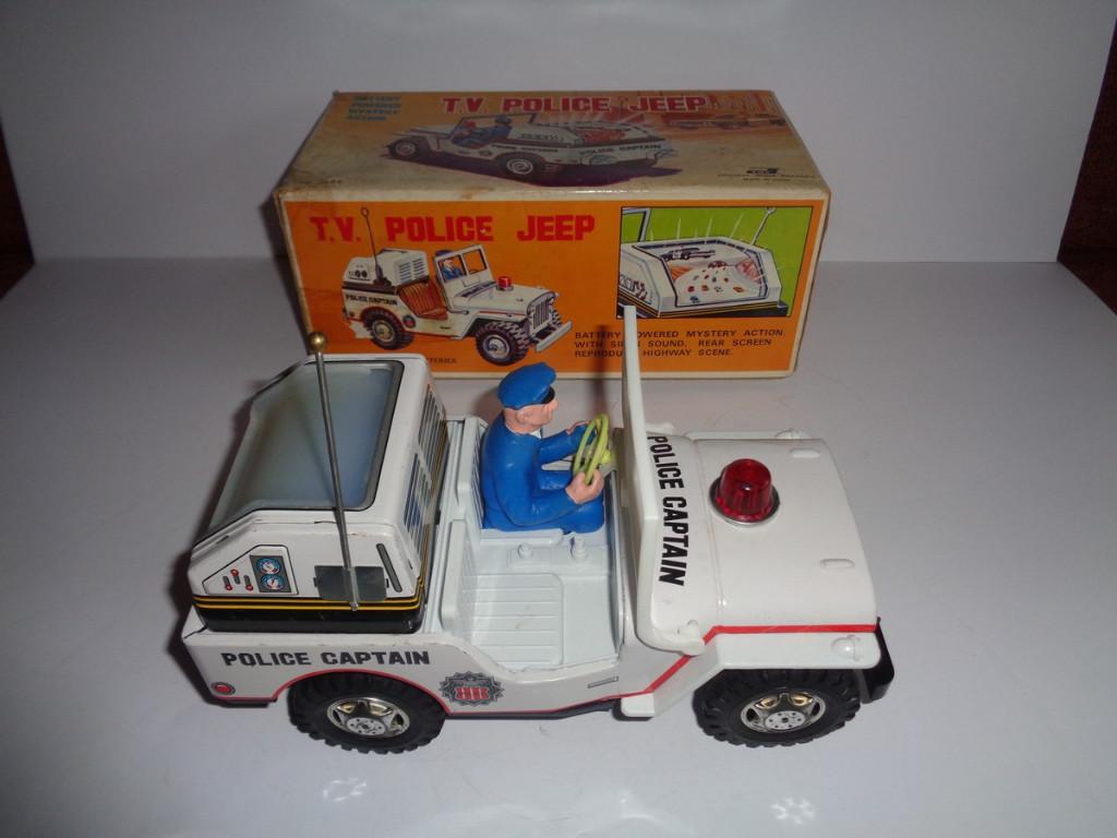 Oude blikken Junior Toys T.V. Police Jeep met doos. Japan, Ophalen of Verzenden, Zo goed als nieuw