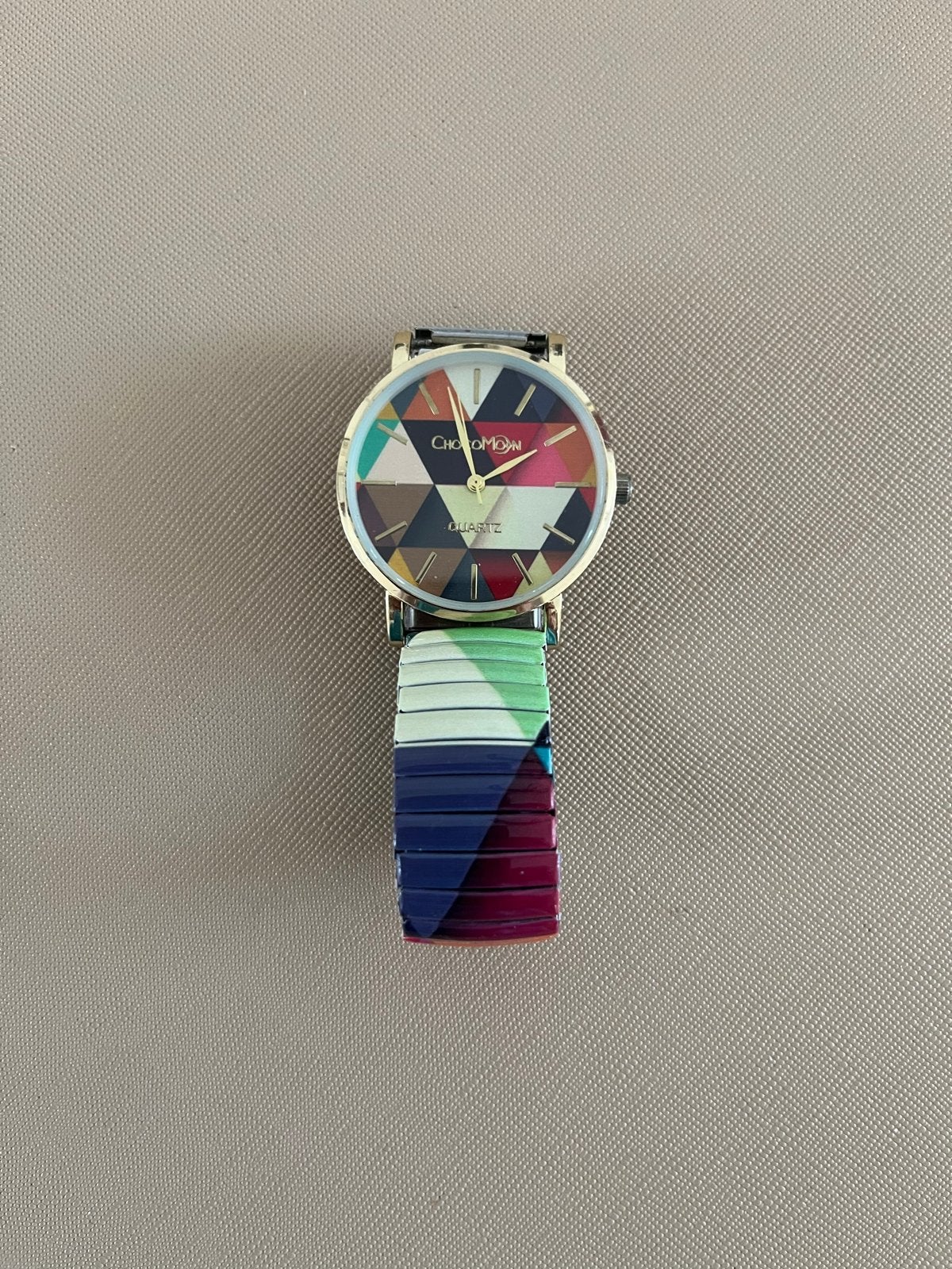 Chocomoonhorloge - kleurrijk en zo goed als nieuw, Overige merken, Overige materialen, Polshorloge, Ophalen of Verzenden