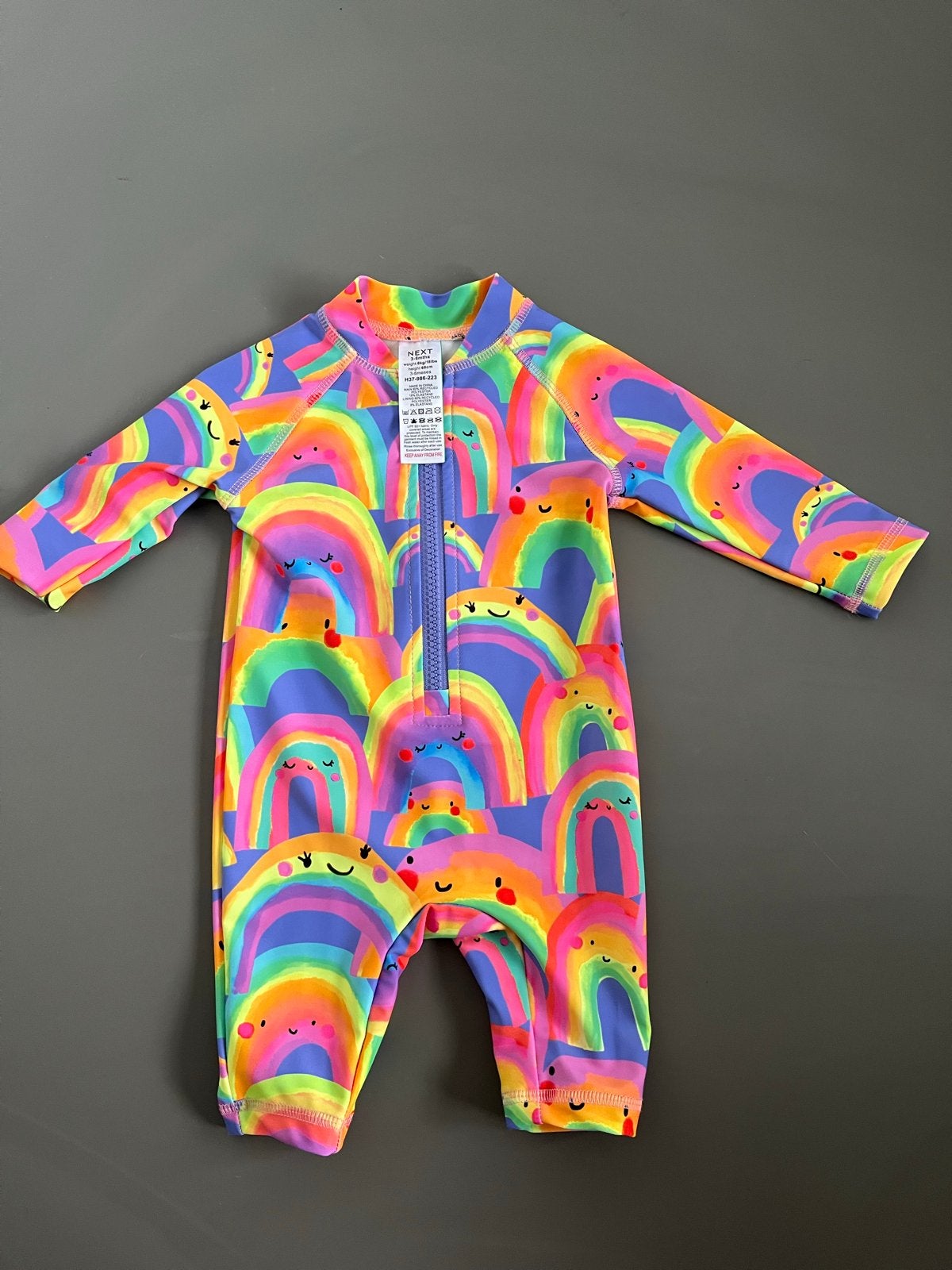 Nieuw Next regenboog UV-zwempakje maat 68, Ophalen, Badpak, Nieuw, Maat 68