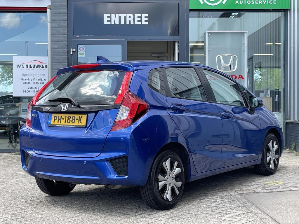 Honda Jazz 1.3 i-VTEC Comfort | Navi | Airco | Cruise Contro, Auto's, 12 maanden, Gebruikt, 4 cilinders, Blauw