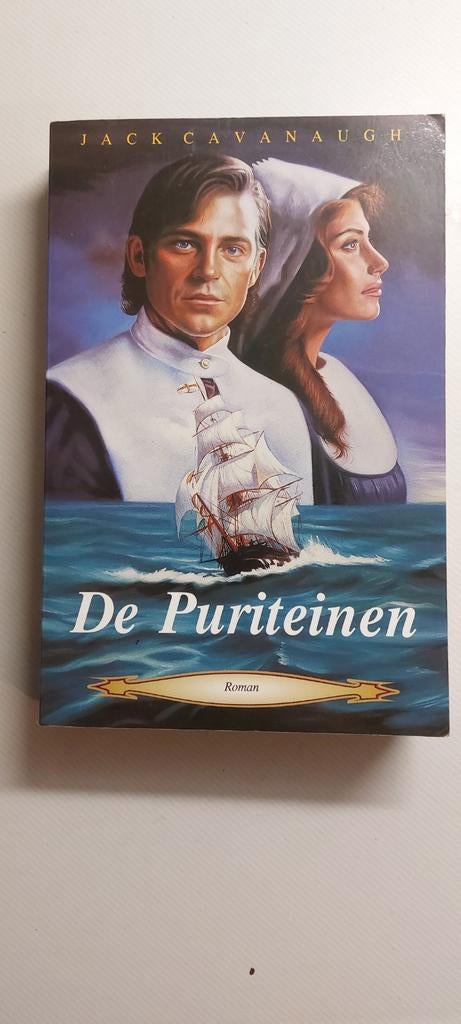 Boek: De Puriteinen - Jack Cavanaugh, Boeken, Romans, Gelezen, Ophalen of Verzenden