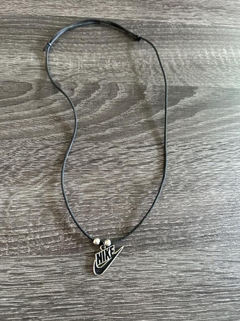 Nike ketting met verstelbaar koord, Gebruikt, Zwart, Ophalen of Verzenden, Overige materialen