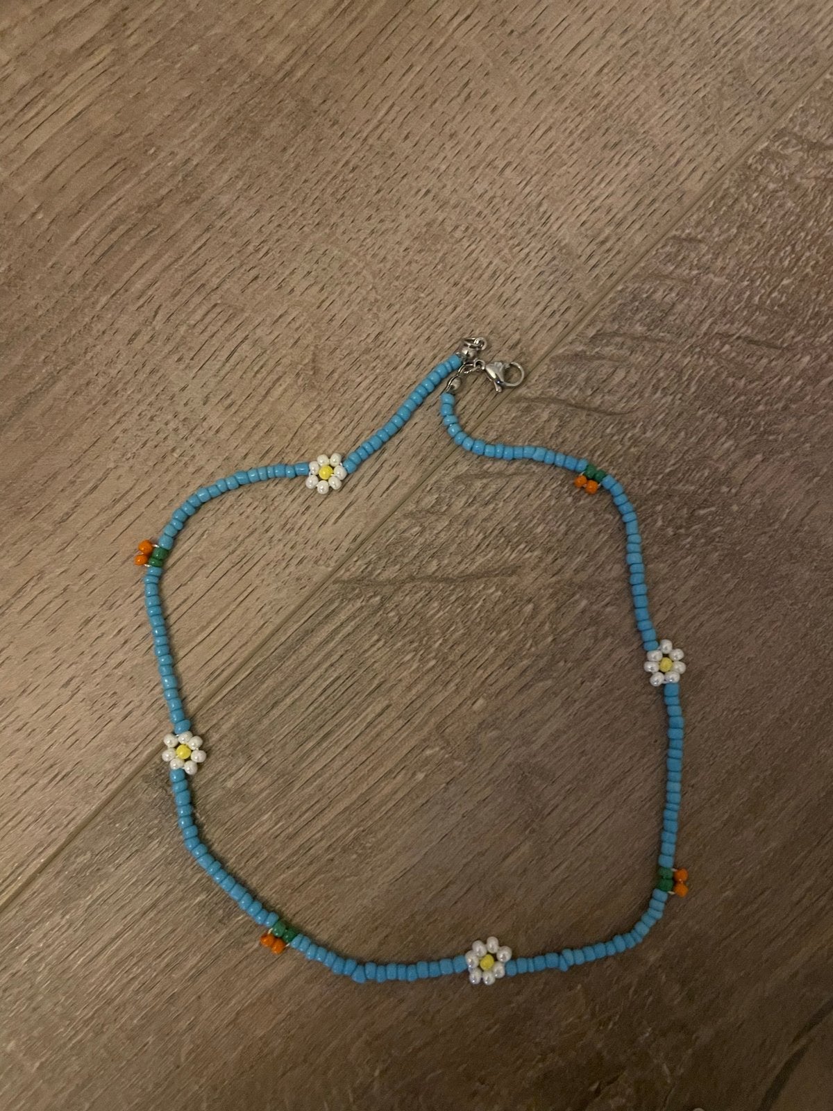 Blauwe kralenketting met bloemetjes, Overige materialen, Verstelbaar, Blauw, Ophalen of Verzenden
