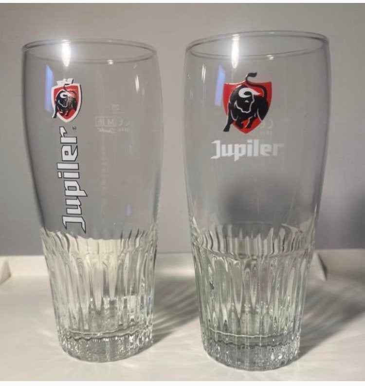 2 Verschillende Jupiler bierglazen. 25 cl. Hoogte 15 cm, Verzamelen, Ophalen of Verzenden, Zo goed als nieuw, Glas of Glazen, Jupiler
