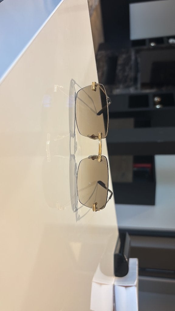 Cartier CT02590-002 Gold Rimless Zonnebril Compleet met doos, Ophalen of Verzenden, Gebruikt, Zonnebril, Overige merken
