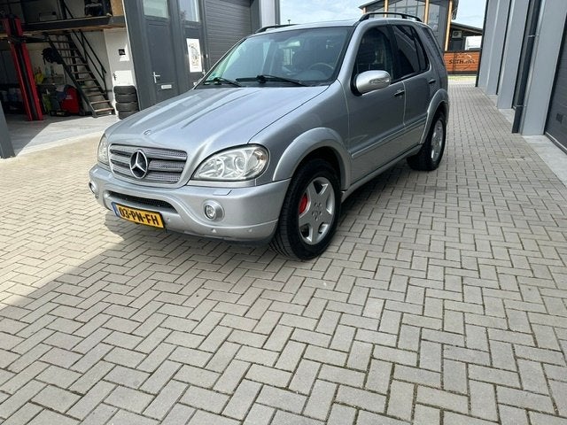 Mercedes-Benz M-Klasse 5.4 Ml55 AMG 4MATIC AUT 2002 Grijs, Auto's, Mercedes-Benz, Particulier, M-Klasse, 4x4, ABS, Airbags, Airconditioning