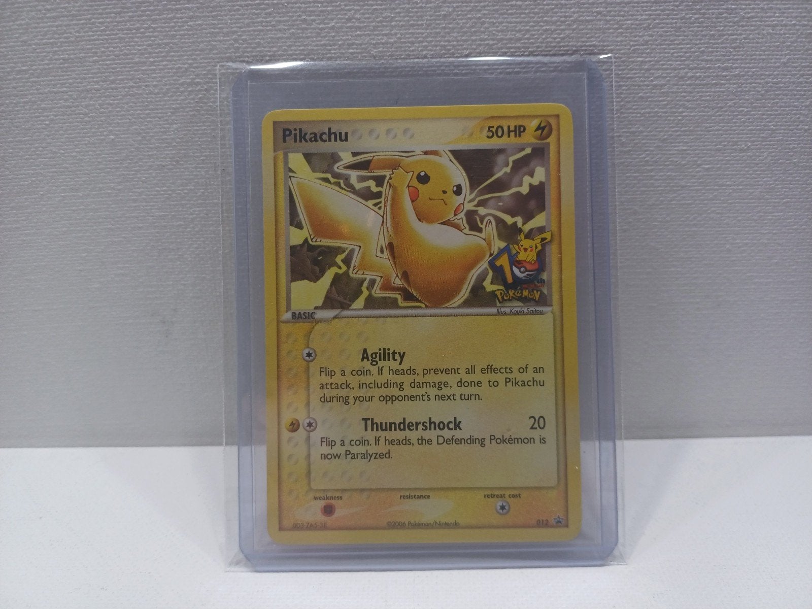 Pikachu Black Star Promo 10th Anniversary 2006 012 Near Mint, Ophalen of Verzenden, Zo goed als nieuw, Losse kaart