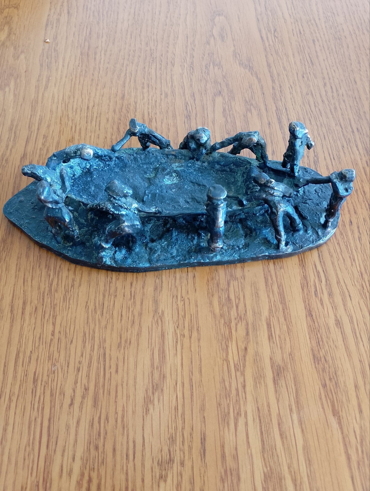 Bronzen sculptuur:  reddingsboot Alleen ophalen, Ophalen
