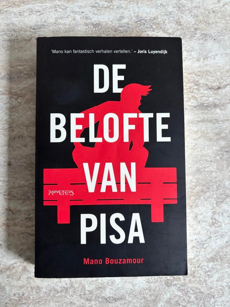 De Belofte van Pisa - Mano Bouzamour (Boek), Ophalen of Verzenden, Gelezen, Nederland