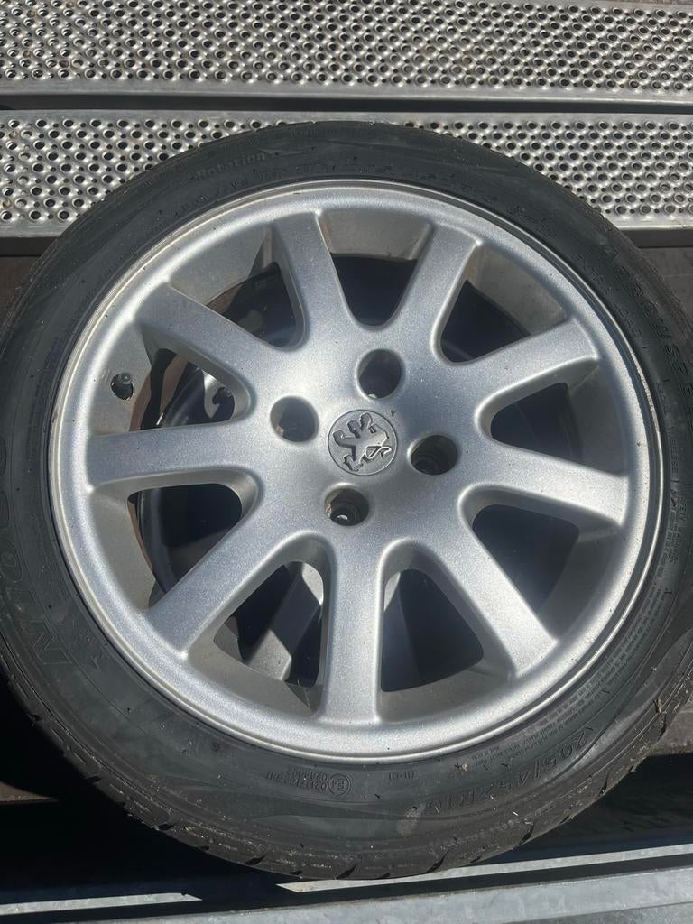 Lichtmetalen velgen met banden voor Peugeot 206cc, Ophalen, Gebruikt