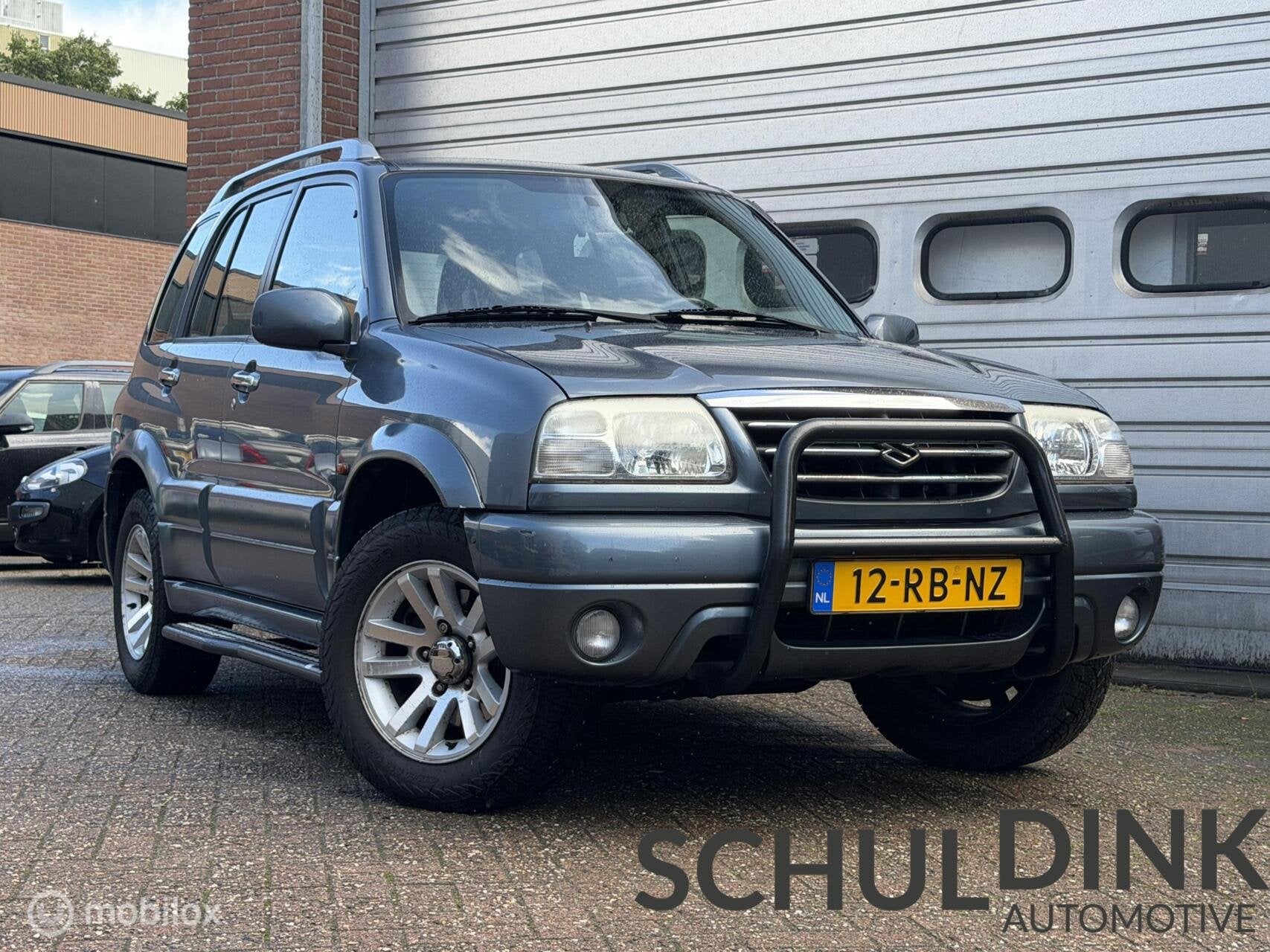 Suzuki Grand Vitara 2.0 FreeStyle-3 4x4 AIRCO|LEDER|TREKHAAK, 1330 kg, 4 cilinders, Grand Vitara, Handgeschakeld