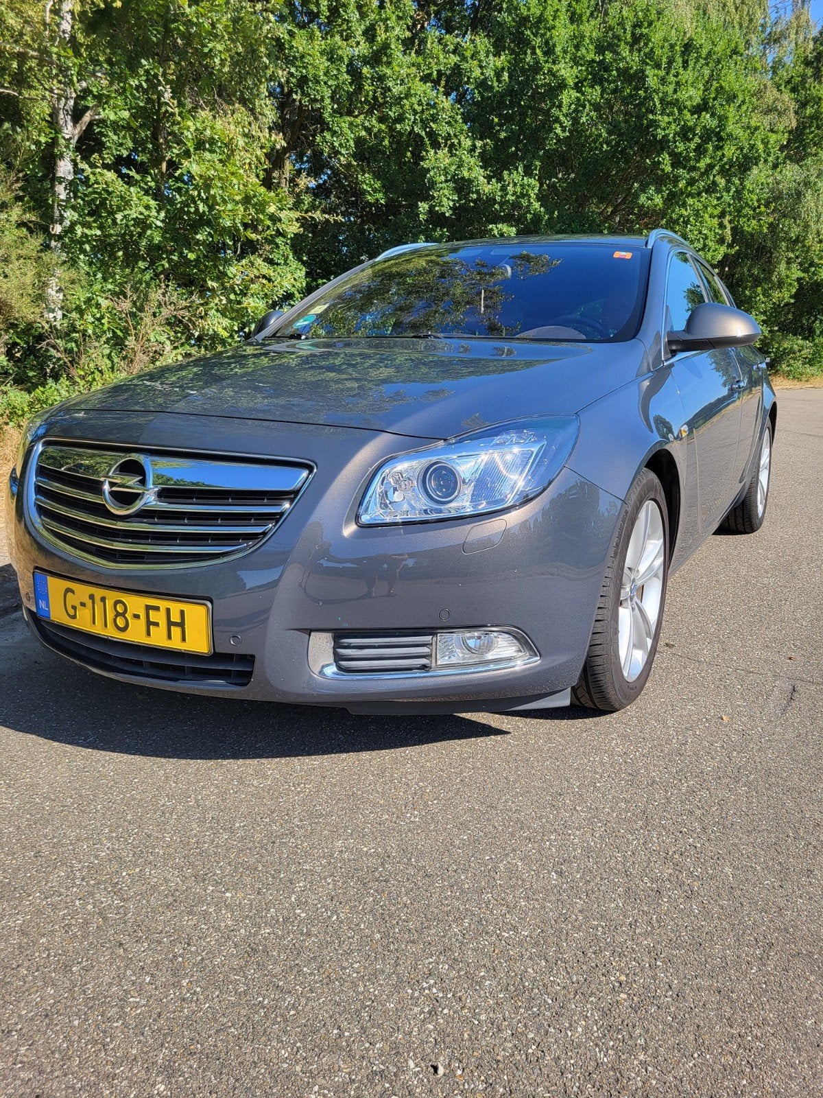 Opel Insignia 1.4 Turbo 103KW Sports Tourer 2013 Grijs, Auto's, 4 cilinders, Leder, Handgeschakeld, Particulier