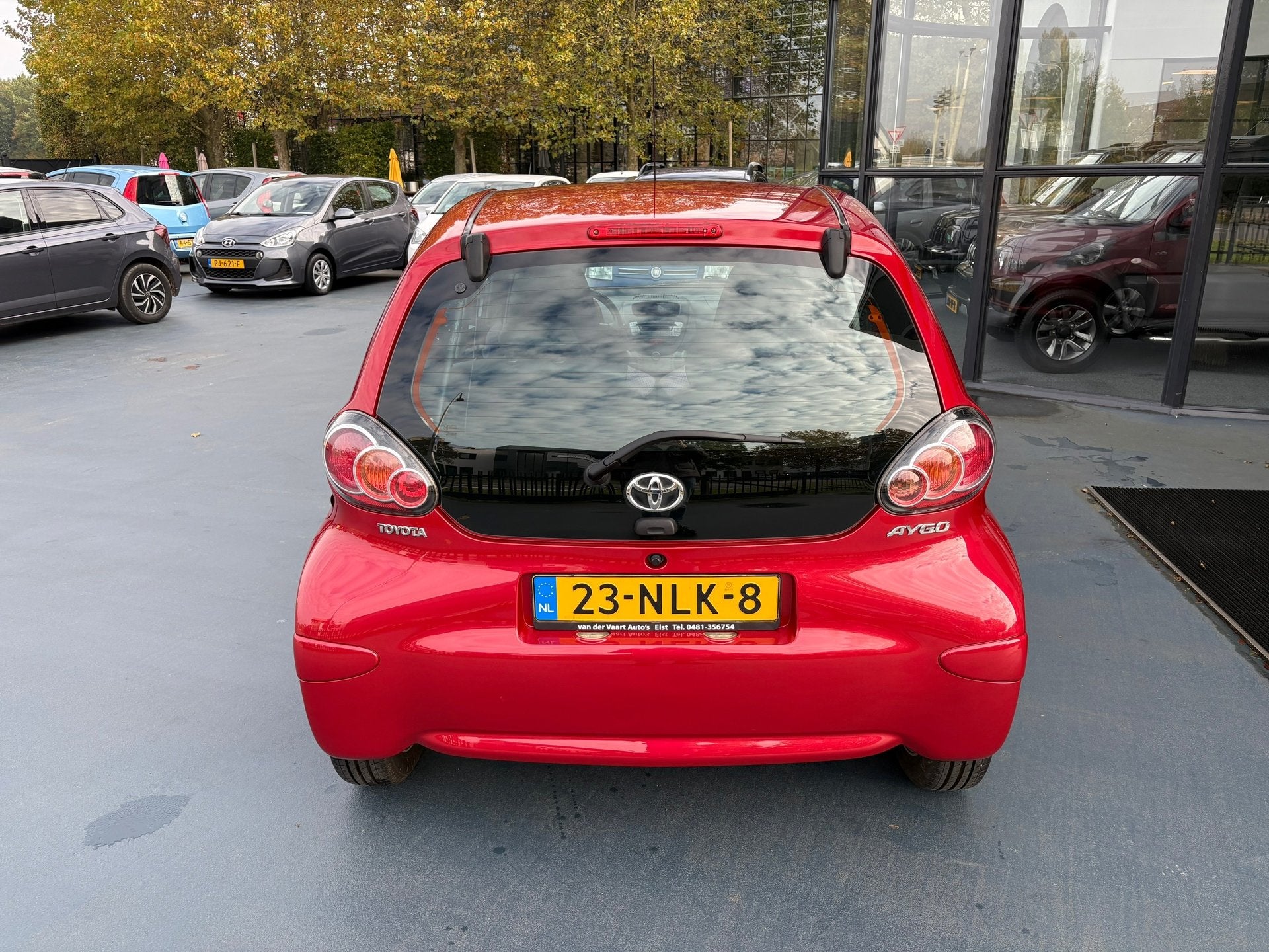 Toyota Aygo 1.0-12V Aspiration Red AIRCO LMV, Auto's, Voorwielaandrijving, Dealer onderhouden, Gebruikt, 4 stoelen