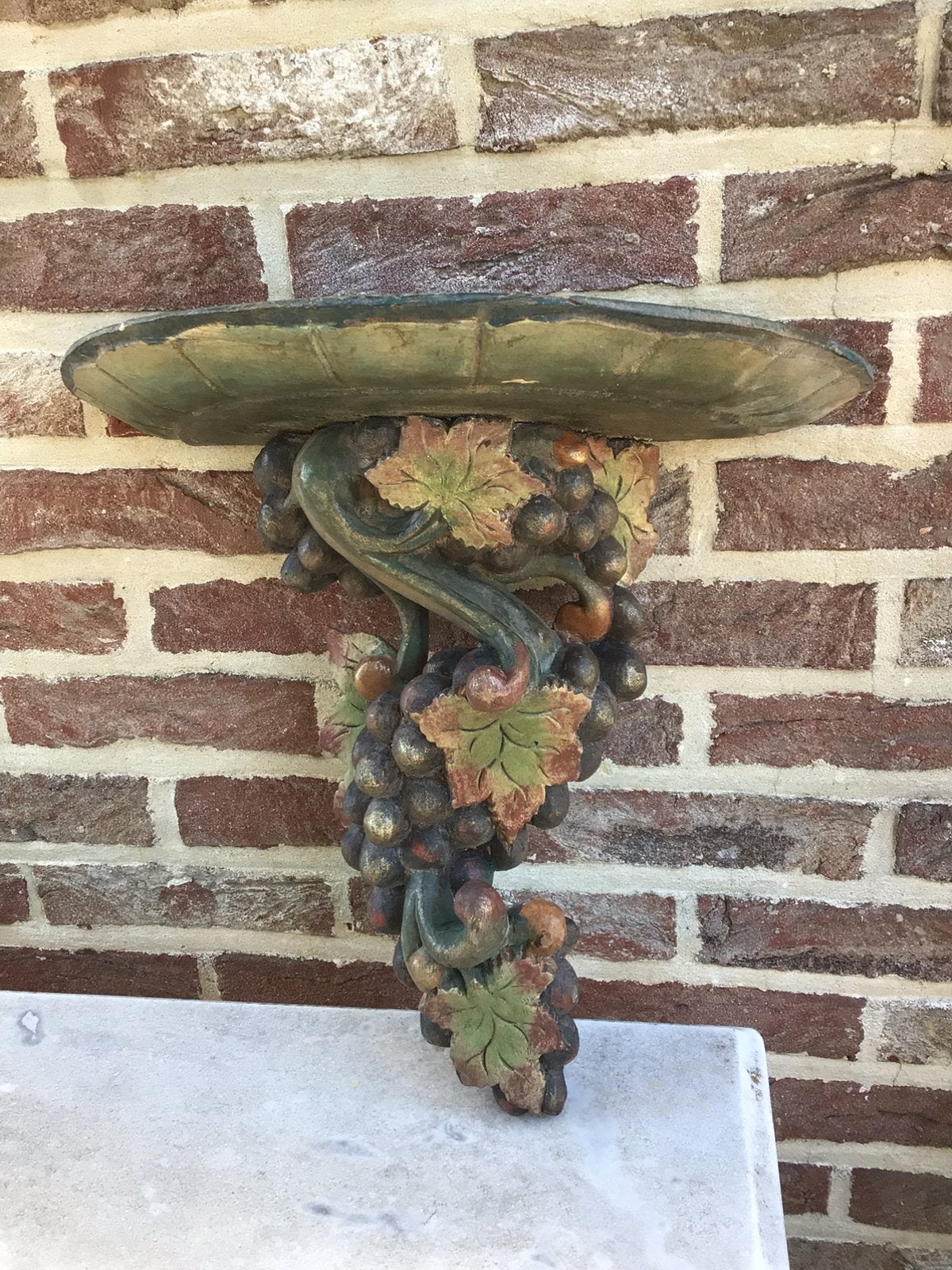 Console in hout met druiven tros, Ophalen