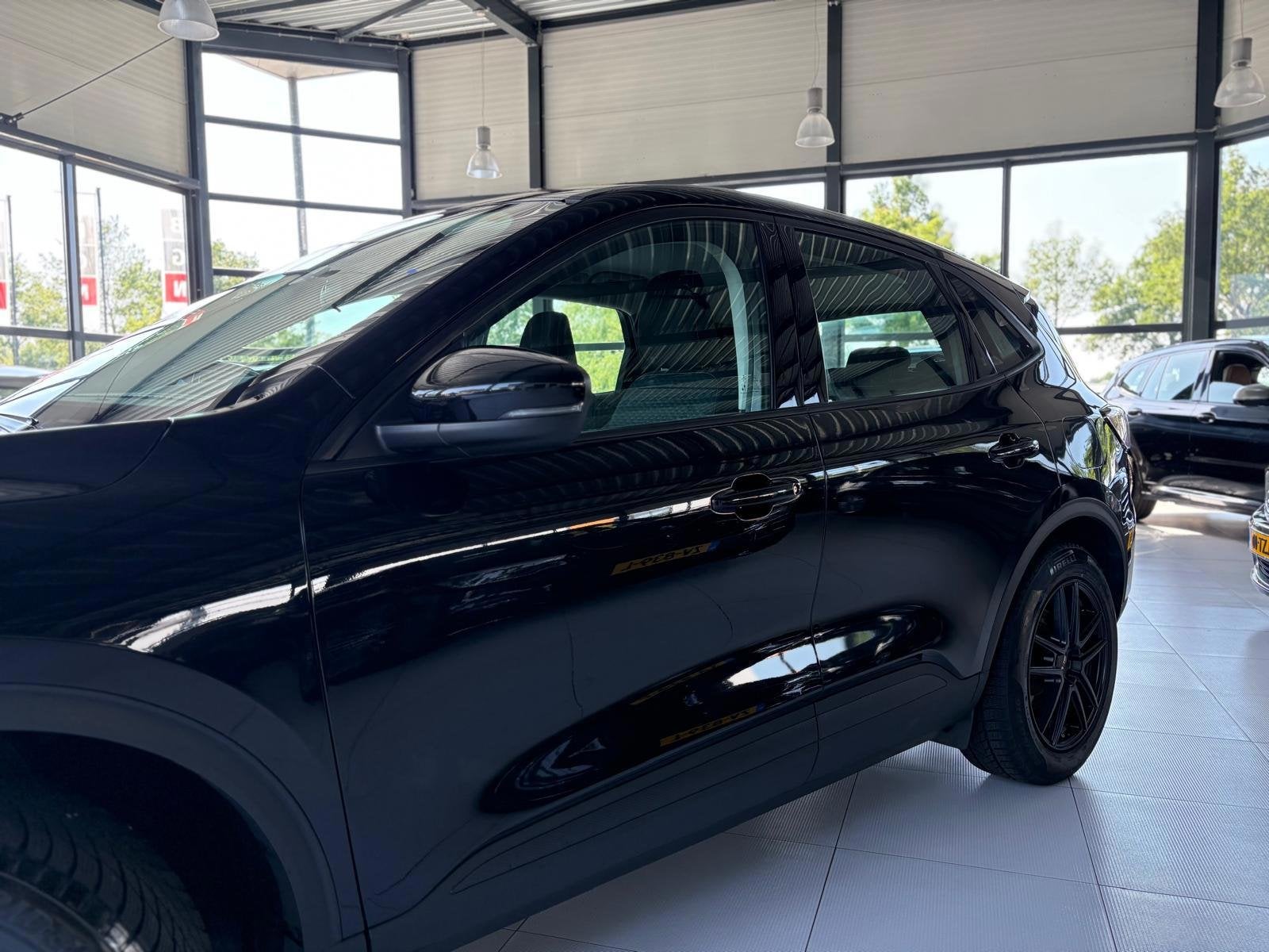 Ford Kuga 1.5 EcoBoost Trend | Trekhaak | Stoelverwarming |, Auto's, Voorwielaandrijving, Gebruikt, 4 cilinders, Zwart