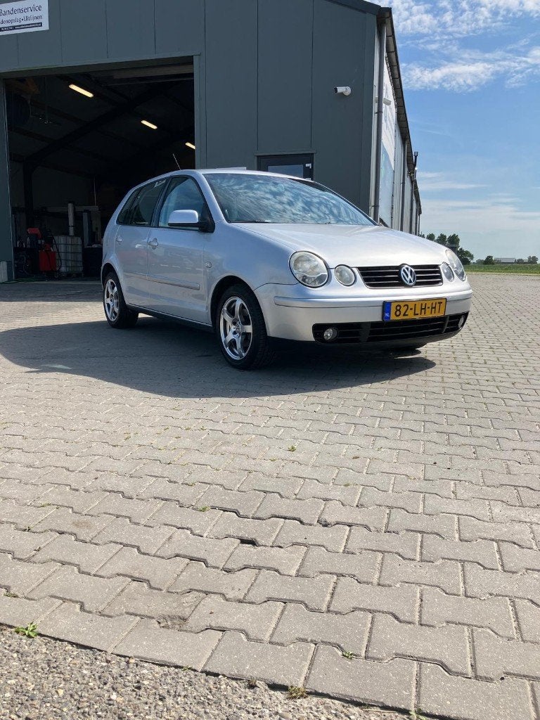 Volkswagen Polo 1.4 74KW 2003 Grijs, Auto's, Volkswagen, Particulier, Polo, ABS, Climate control, Lederen bekleding, Lichtmetalen velgen