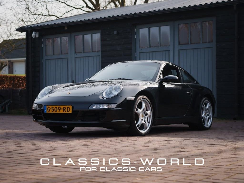 Porsche 997 911 Carrera 3.6 Tiptronic – Black – Rebuilt, Auto's, Automaat, Gebruikt, Overige modellen, 4 stoelen