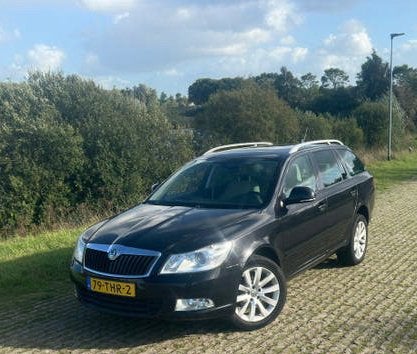 Skoda Octavia 1.2 TSI Combi 2012 Zwart, Auto's, Voorwielaandrijving, 4 cilinders, Zwart, Origineel Nederlands