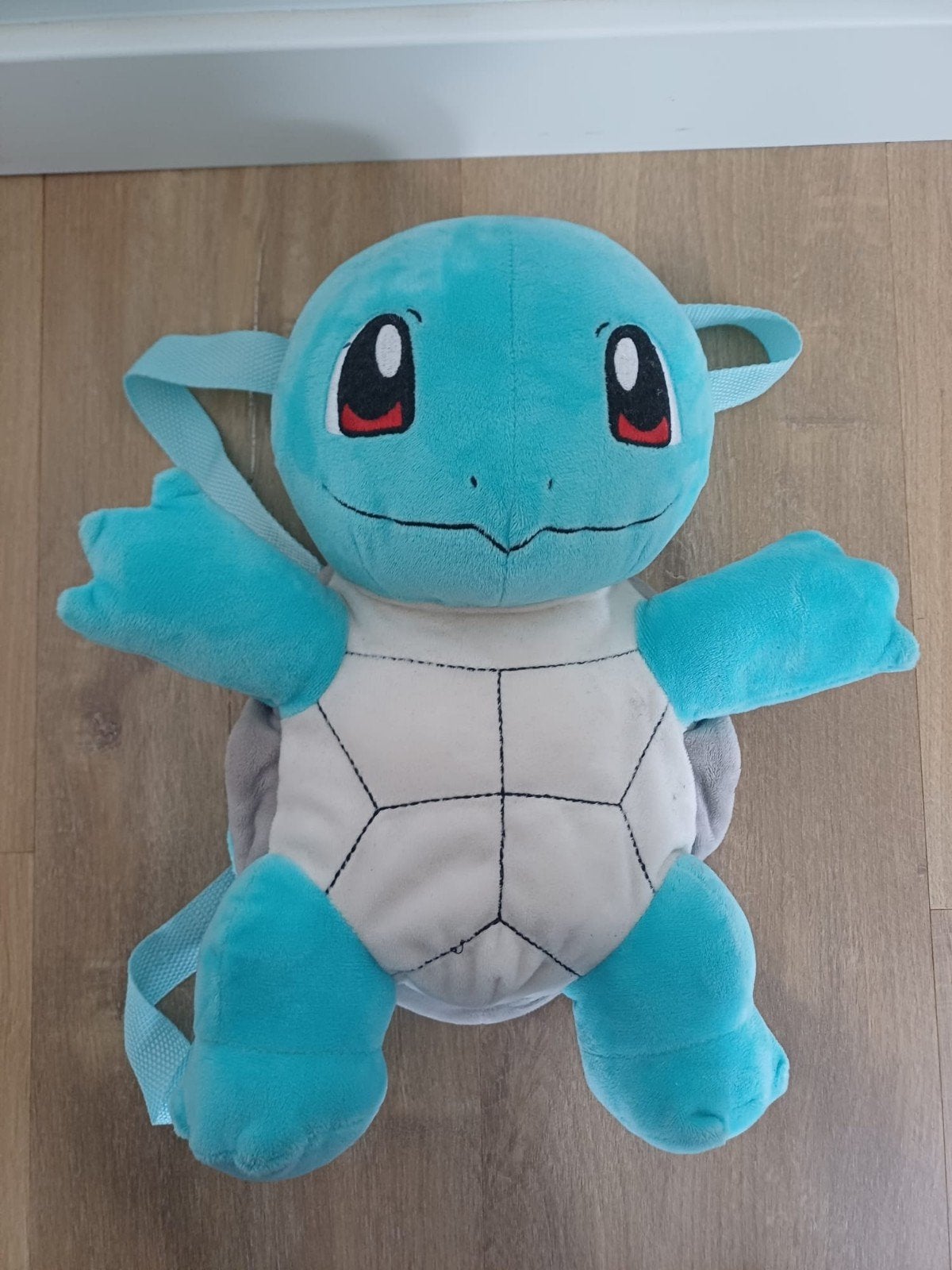 Pokémon: squirtle rugtas / knuffel, Ophalen of Verzenden, Zo goed als nieuw, Overige typen