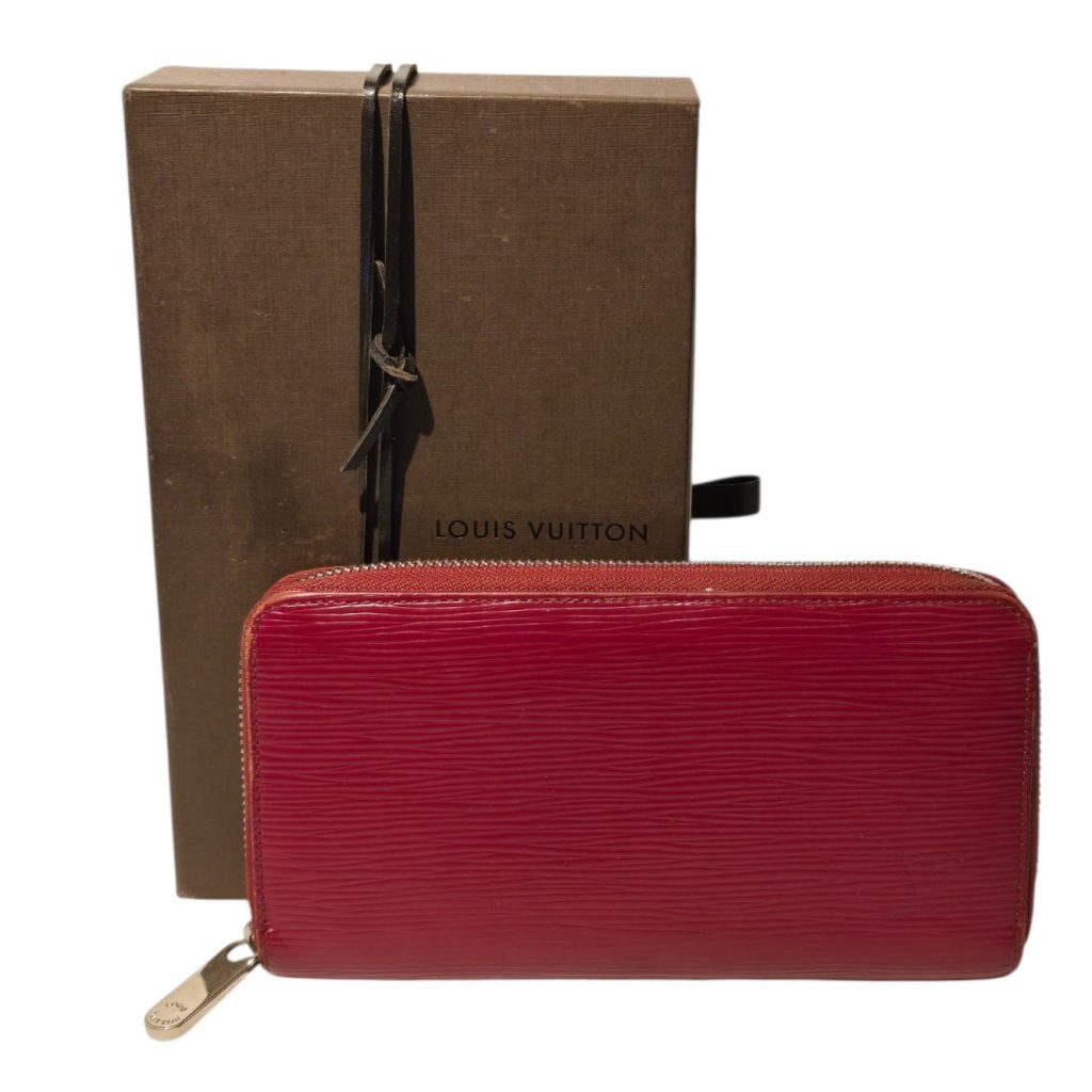 Louis Vuitton Red Epi Leather Zippy Wallet 2012, Louis Vuitton, Gebruikt, Support@louisvuitton.com, 2 Rue du Pont Neuf
75001 Paris
France