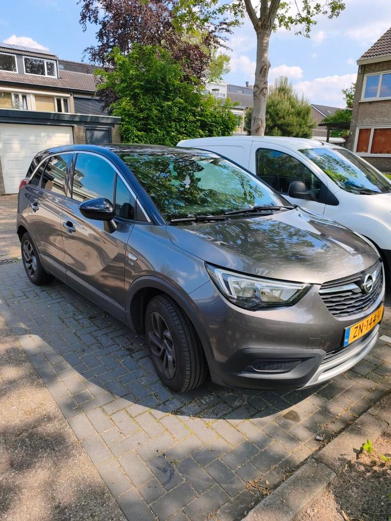 Opel Crossland X 1.2 Turbo 110pk Start/stop 2019 Grijs, Auto's, Voorwielaandrijving, 1199 cc, Origineel Nederlands, Handgeschakeld