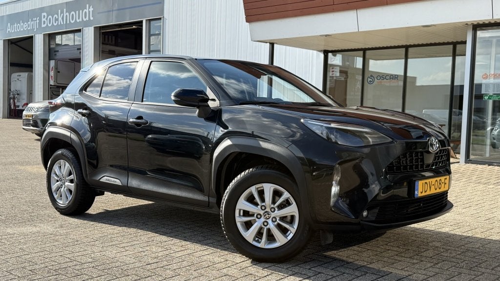 Toyota Yaris Cross 1.5 Hybrid Dynamic | Navi | Camera | Crui, Auto's, Stof, Gebruikt, 1490 cc, Bedrijf