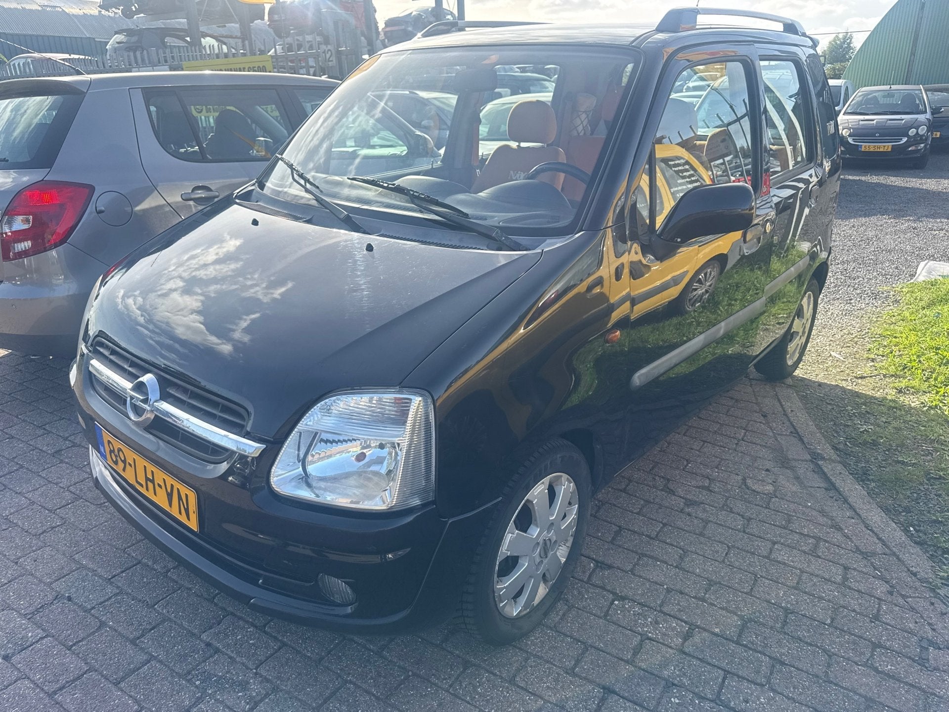 Opel Agila 1.2-16V Njoy incl nieuwe apk!, Auto's, Voorwielaandrijving, 15 km/l, Zwart, Origineel Nederlands