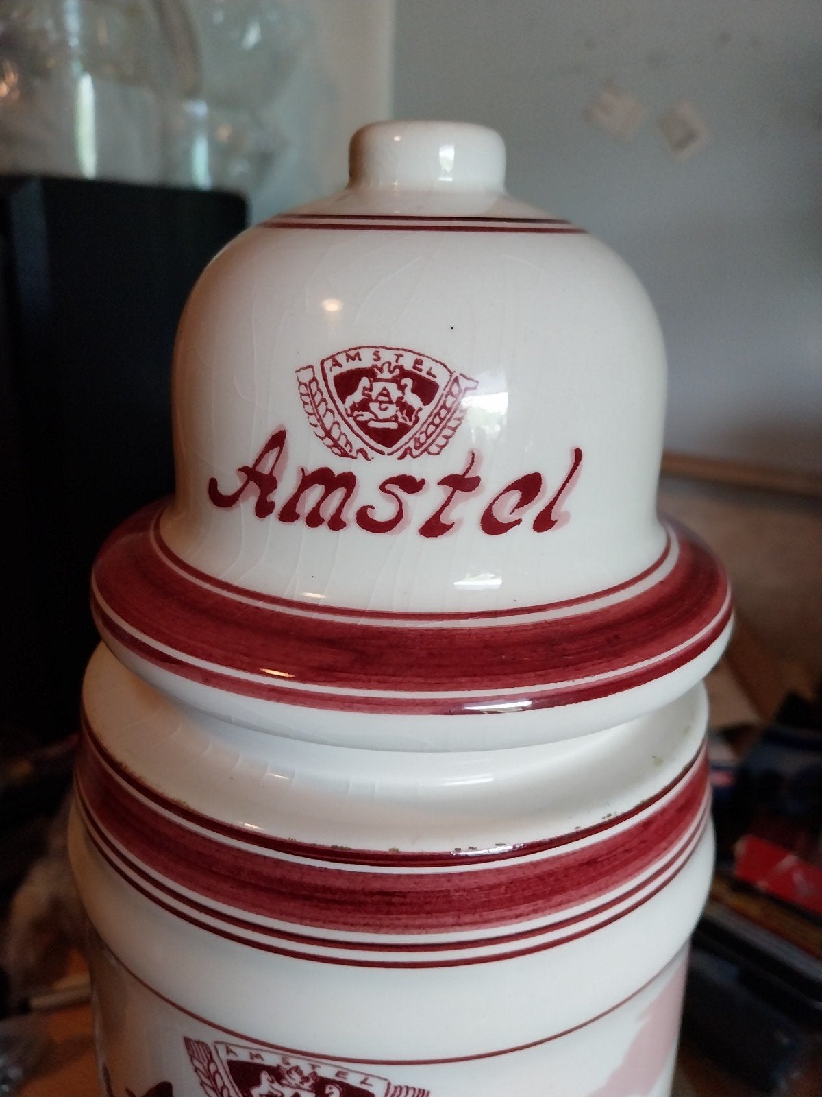 Amstel Bier met Amsterdamse Grachtenpanden, Ophalen