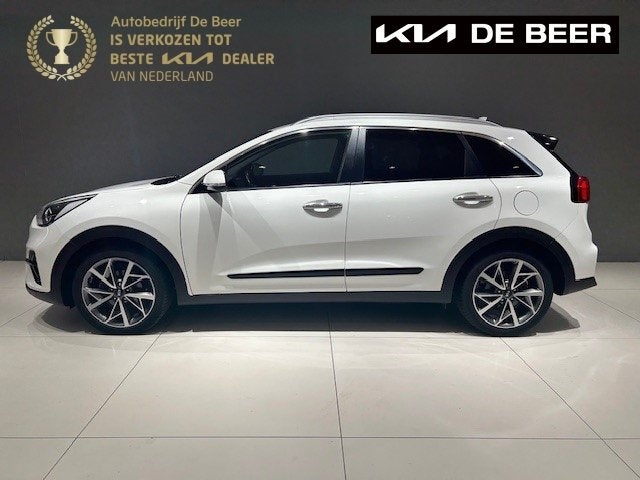 KIA Niro 1.6 GDi Hybrid 141pk DCT6 DynamicPlusLine, Auto's, Gebruikt, Leder en Stof, Wit, Origineel Nederlands