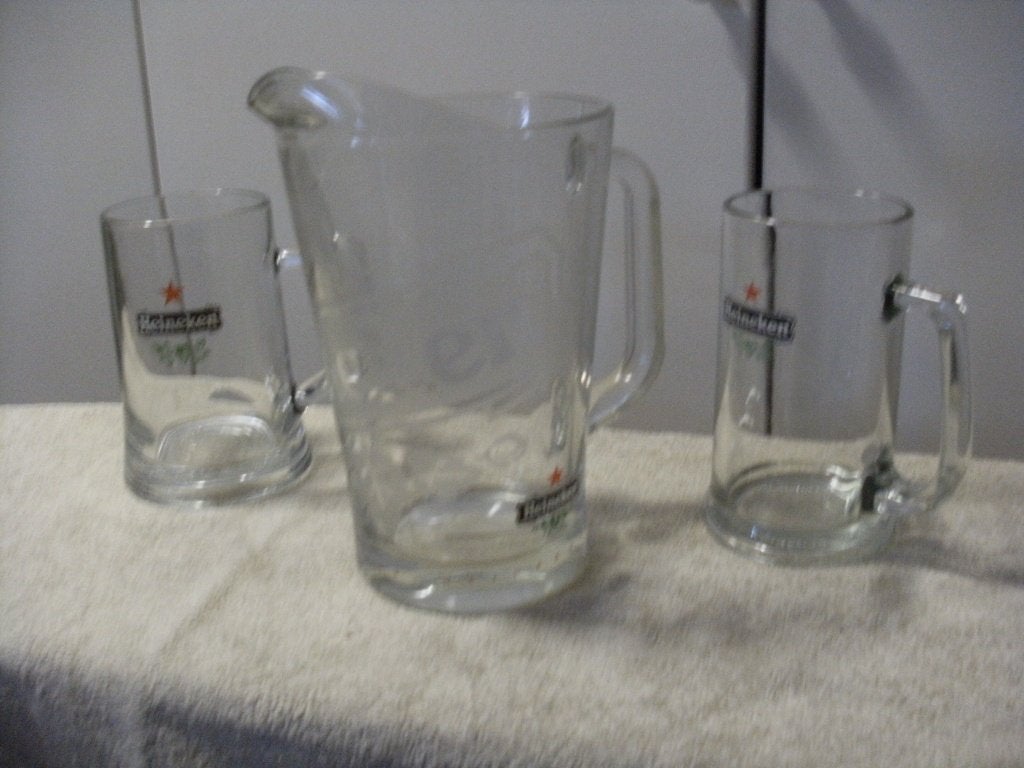 heineken glazen en schenkkan, Ophalen of Verzenden, Zo goed als nieuw, Glas of Glazen, Heineken