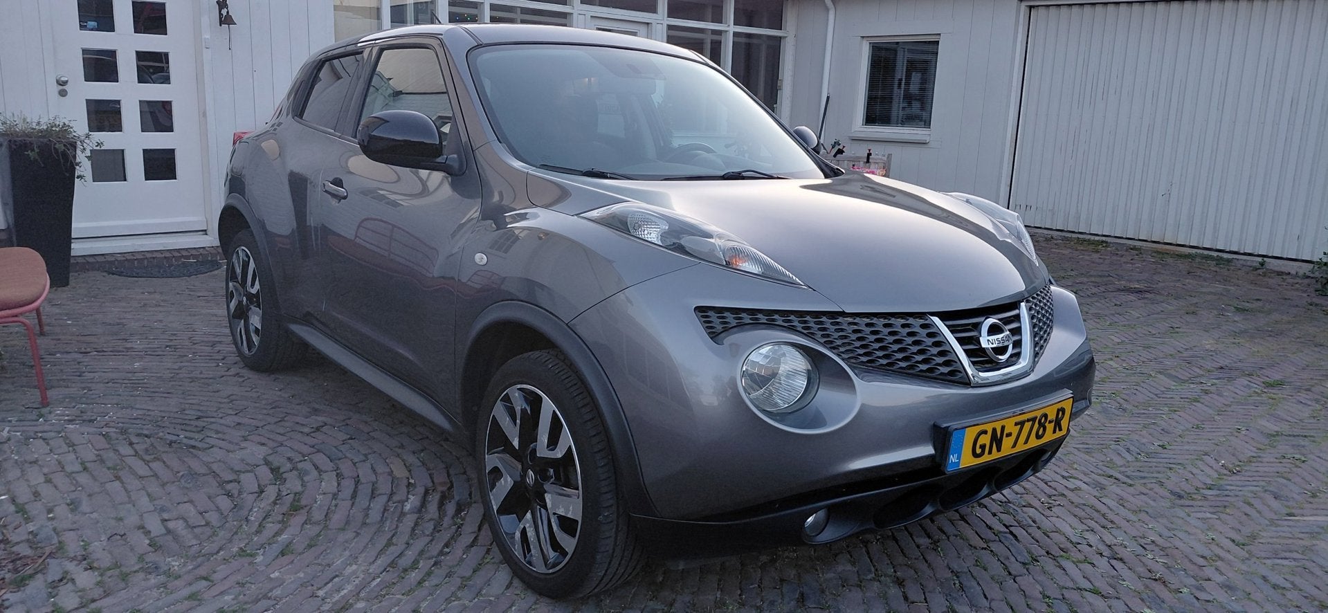 Nissan Juke 1.6 Tekna ,Als nieuw! Slecht 51207 km van 2e eig, Auto's, Voorwielaandrijving, Euro 5, Stof, Huisgarantie