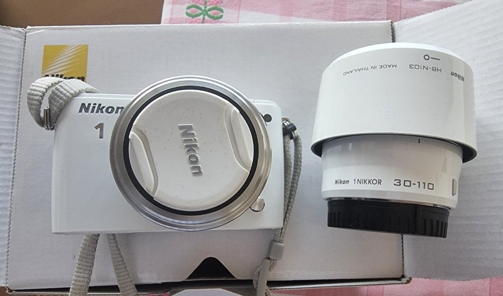 Fotocamera NIKON S1, Audio, Tv en Foto, Bodydop, Ophalen of Verzenden, Zo goed als nieuw, 4 t/m 7 keer