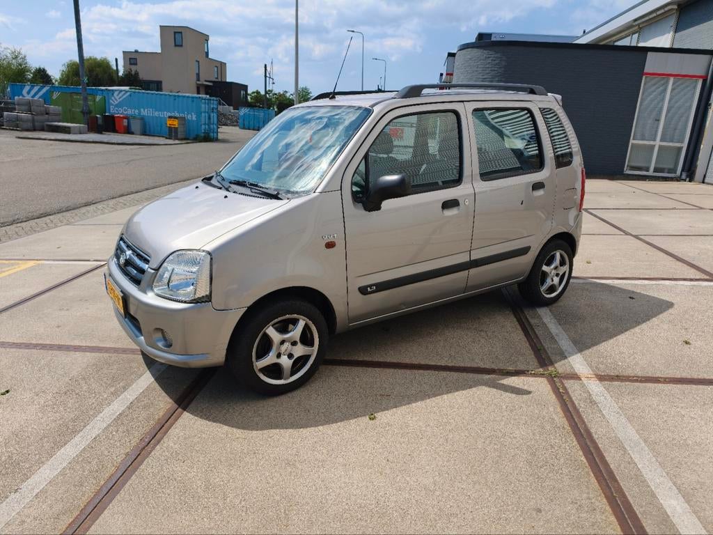 Suzuki Wagon R+ 1.3 AUT Bij 2005 airco apk nap top onder., Stof, 40 €/maand, Wagon R+, Bedrijf
