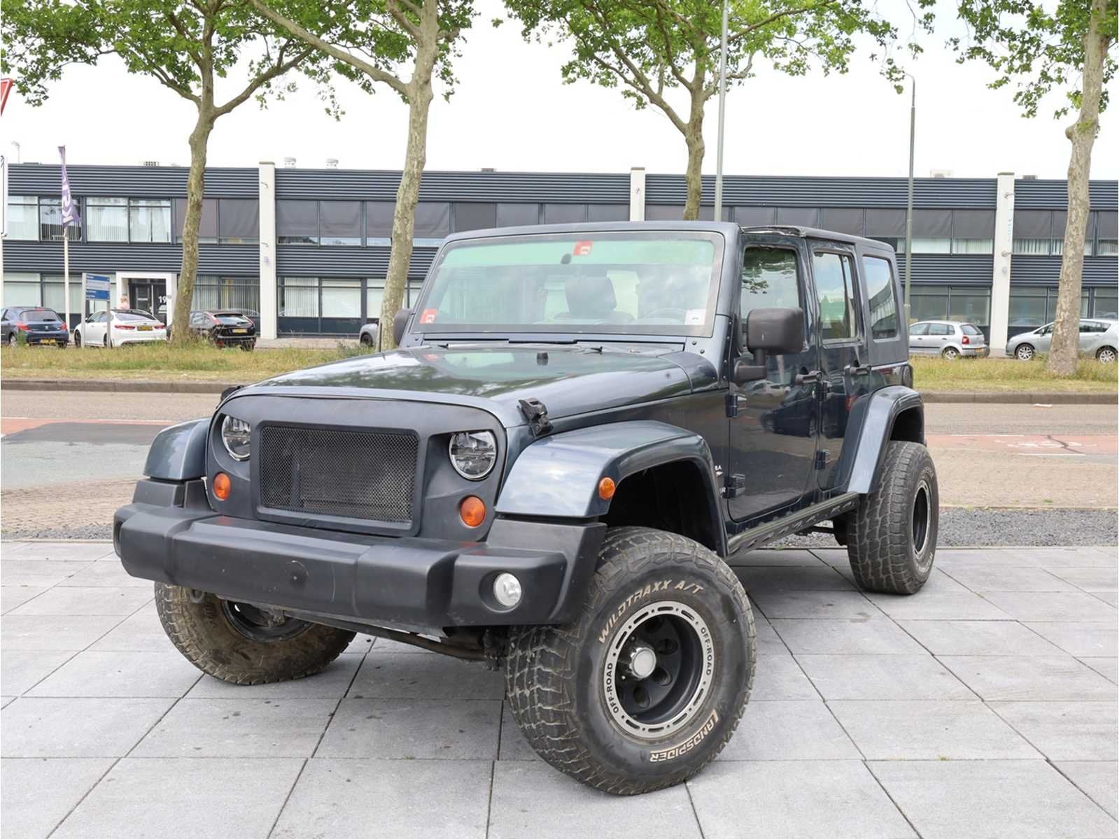 Jeep Wrangler Unlimited Sahara 3.8 4WD Automaat 2008, Auto's, Jeep, Automaat, Gebruikt, Overige carrosserieën, Bedrijf