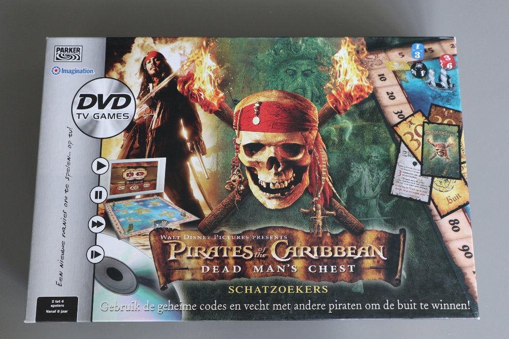 Pirates of the Caribbean piraat piraten dvd spel schatzoeker, Vijf spelers of meer, Ophalen of Verzenden, Zo goed als nieuw, Parker