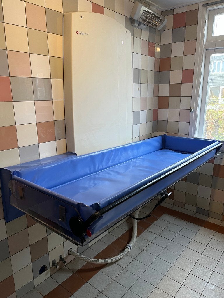 Hoog-laag douchebrancard (muurbevestiging) Lopital Scirocco, Ophalen of Verzenden, Zo goed als nieuw