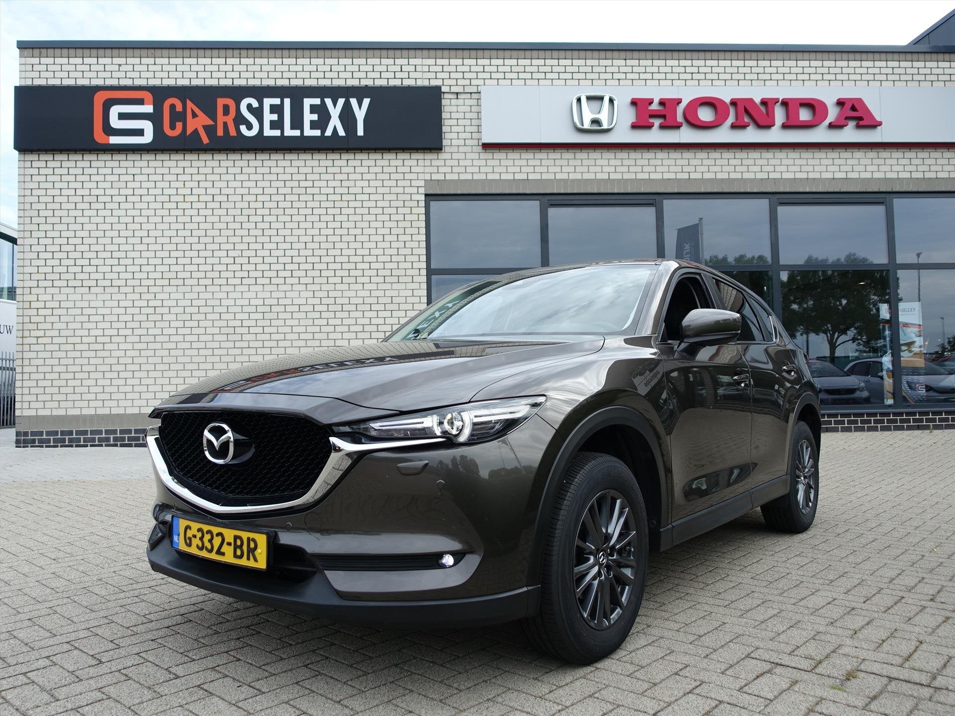MAZDA Cx-5 2.0 SKYACTIV-G 165pk Automaat Business Comfort Af, Auto's, 1998 cc, Gebruikt, 4 cilinders, 2000 kg