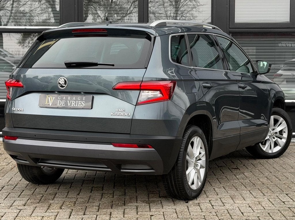 Skoda Karoq 1.5 TSI ACT Style Business DSG ACC CarPlay Keyle, Auto's, Skoda, Stof, Zwart, 4 cilinders, 150 pk