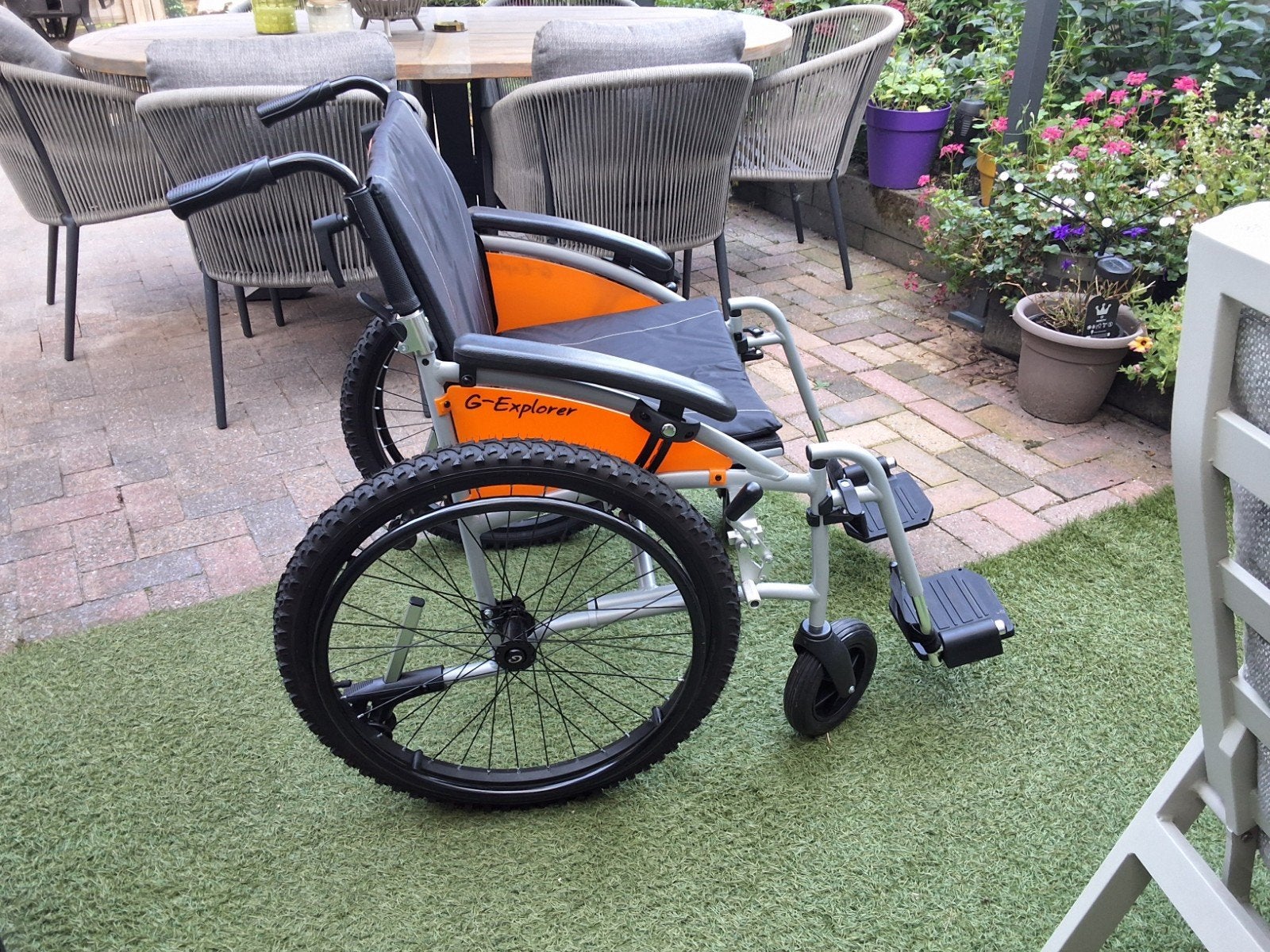 rolstoel Excel G Eplorer orange zwart, Diversen, Rolstoelen, Ophalen, Zo goed als nieuw, Duwrolstoel